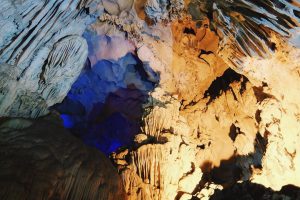 Visiting a cave is one of the things to do in Halong bay