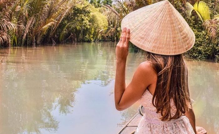 Girl on a boat on Mekong Delta